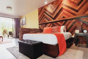 Voodi või voodid majutusasutuse Yellow Tree Suites toas