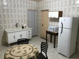 Dapur atau dapur kecil di GA3-Hospedagem Próximo ao Aeroporto de Guarulhos