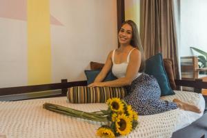 Voodi või voodid majutusasutuse Yellow Tree Suites toas