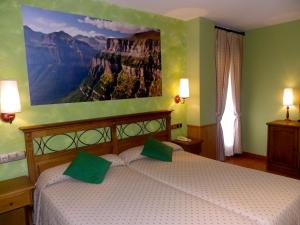 
Cama o camas de una habitación en Hotel Arnal
