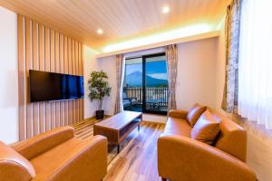 TV a/nebo společenská místnost v ubytování 05 Resort Club -然ZEN-