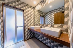 Postel nebo postele na pokoji v ubytování 06 Resort Club -粋IKI-