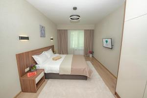Letto o letti in una camera di Crystal Residence