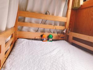 Katil dua tingkat atau katil-katil dua tingkat dalam bilik di Minsyuku Koshiyama