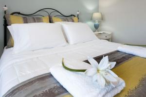 Gulta vai gultas numurā naktsmītnē Exclusive Private Villa in Viros