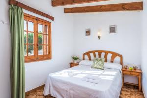 Łóżko lub łóżka w pokoju w obiekcie Villa Menorca Jalima 1 by Mauter Villas