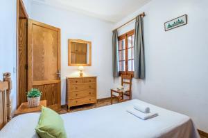 Łóżko lub łóżka w pokoju w obiekcie Villa Menorca Jalima 1 by Mauter Villas