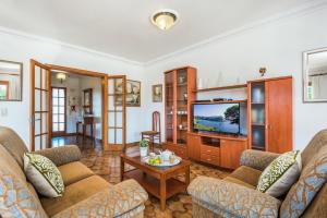 Telewizja i/lub zestaw kina domowego w obiekcie Villa Menorca Jalima 1 by Mauter Villas