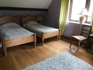 Cama ou camas em um quarto em Domaine des Courtils
