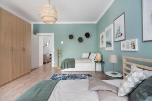 Posteľ alebo postele v izbe v ubytovaní Caring Family Apartment Close To The Center