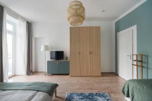 TV a/nebo společenská místnost v ubytování Caring Family Apartment Close To The Center