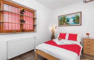 Postel nebo postele na pokoji v ubytování Vila NINA