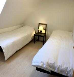 Posteľ alebo postele v izbe v ubytovaní Torvet 19 - Maribo