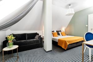 Łóżko lub łóżka w pokoju w obiekcie Hotel Villa Art Novis City Center
