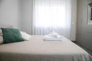 Posteľ alebo postele v izbe v ubytovaní Casa Grande