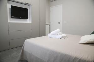 Posteľ alebo postele v izbe v ubytovaní Casa Grande