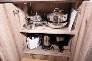 A kitchen or kitchenette at Kincses Sziget Apartman