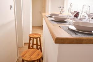 A kitchen or kitchenette at Kincses Sziget Apartman