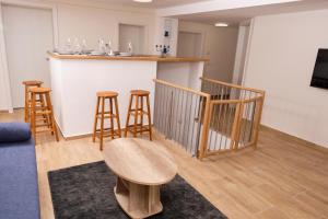 A kitchen or kitchenette at Kincses Sziget Apartman
