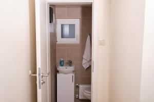 Koupelna v ubytování Kincses Sziget Apartman + 29 fotografií