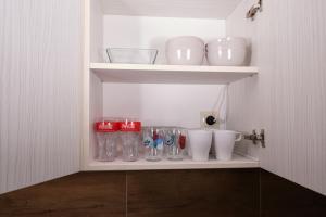 A kitchen or kitchenette at Kincses Sziget Apartman