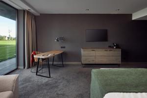 TV a/nebo společenská místnost v ubytování Van der Valk Hotel Leeuwarden