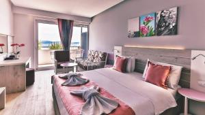 Postel nebo postele na pokoji v ubytování Carine Hotel Park