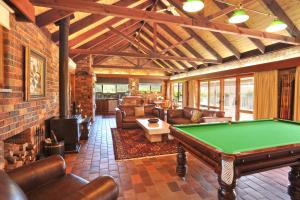 A pool table at Langbrook Cottages