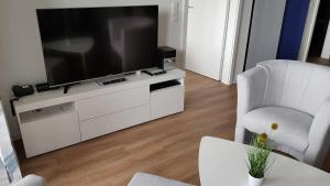TV a/nebo společenská místnost v ubytování Wremer Seemöwe