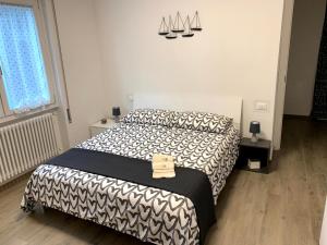 Postel nebo postele na pokoji v ubytování IL BARCAIOLO