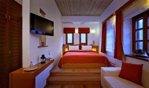 Postelja oz. postelje v sobi nastanitve Kerasies Guesthouse