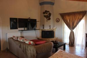 A television and/or entertainment centre at Villa Nefeli