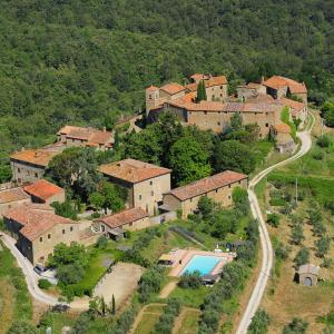 an aerial view of a house with a pool at Borgo Rapale in Rapale