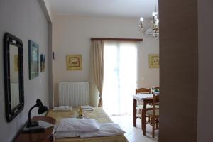 A bed or beds in a room at Villa Nefeli