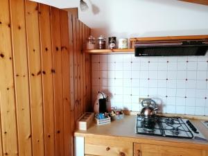 Kuchnia lub aneks kuchenny w obiekcie Sweet Home Casa Vacanze "La Mansarda"
