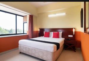 Postel nebo postele na pokoji v ubytování Hotel Vassi Palaze