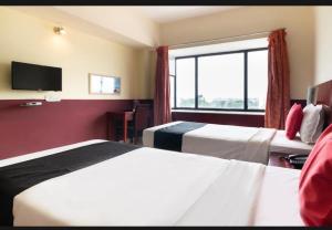 Postel nebo postele na pokoji v ubytování Hotel Vassi Palaze
