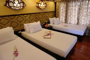 Giường trong phòng chung tại Oriental Sails Cruise +32 ảnh