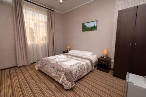 Кровать или кровати в номере Hotel Capri