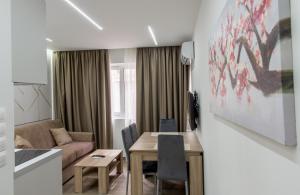 Posedenie v ubytovaní Koios Apartments