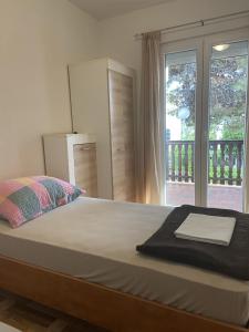 Posteľ alebo postele v izbe v ubytovaní Holiday apartment Natali - by TA Leut Agency