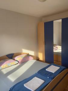 Posteľ alebo postele v izbe v ubytovaní Holiday apartment Natali - by TA Leut Agency