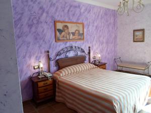 
Cama o camas de una habitación en Hotel El Doncel
