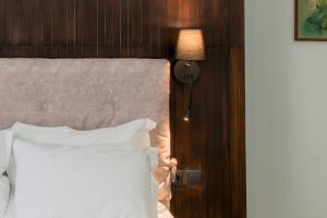 Posteľ alebo postele v izbe v ubytovaní Koios Apartments