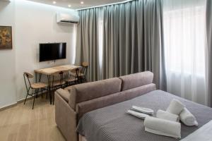 Koios Apartments tesisinde lounge veya bar alanı