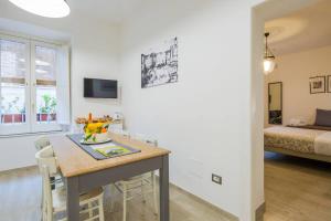 Televízia a/alebo spoločenská miestnosť v ubytovaní Sorrento Time Guest House