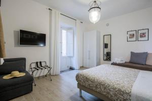 Televízia a/alebo spoločenská miestnosť v ubytovaní Sorrento Time Guest House
