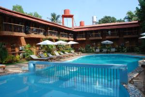 a view of the pool at the resort at Sea Breeze Beach, Calangute, Goa in Calangute
