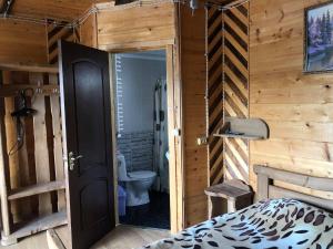 Postel nebo postele na pokoji v ubytování Kabanova Gora