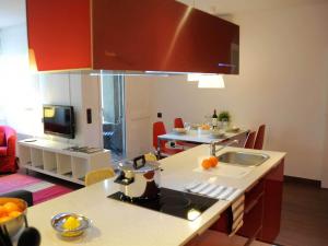 TV a/nebo společenská místnost v ubytování Your Home in Barcelona Apartments + 13 fotografií